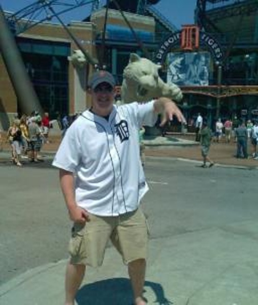TEAMDetroit Tigers CITY:Detroit STADIUM:Comerica Park   Imitating the Tigers claw in front of Comerica Field.
