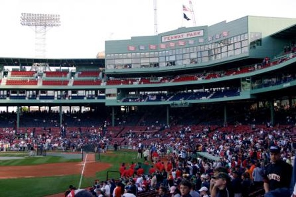 TEAM:Boston Red Sox CITY:Boston STADIUM:Fenway Park   Inside Fenway Park during batting practice. This is a great spot to snag foul balls. One of the young boys on our family vacation tour took home an extra souvenir.