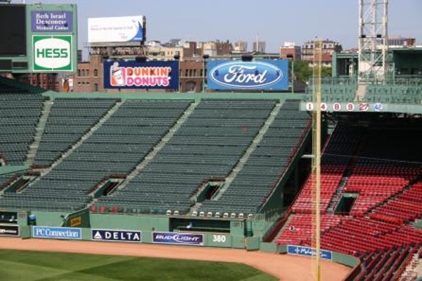 TEAM:Boston Red Sox CITY:Boston STADIUM:Fenway Park   View of the right field bleachers and the one red seat marking the longest home run hit at Fenway.