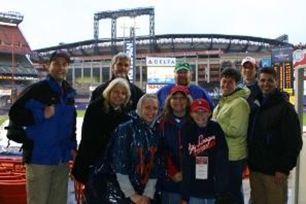 TEAM:New York Mets CITY:New York STADIUM:Citi Field   Waiting out a rain delay at Shea Stadium. You can see Citi Field being built in the background.