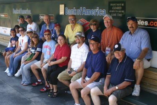 TEAM:Baltimore Oriole CITY:Baltimore STADIUM:Oriole Park   Our small group tour in the Orioles dugout on a private stadium tour of Oriole Park. Awesome park. Great tour. Delicious barbeque!