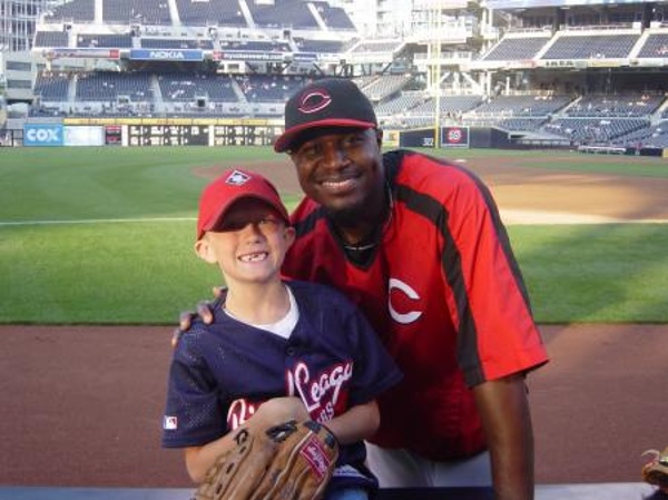 Team: Cincinnati Reds City: San Diego Stadium: Petco Park My son with Brandon Phillips in PETCO Park. Brandon tossed a ball to him and then came over for an autograph and a photo.