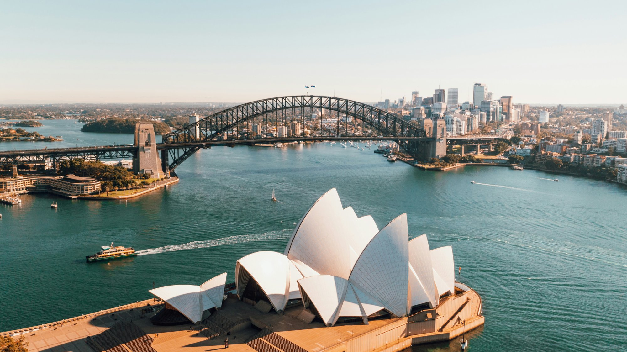 Sydney Aus aerial view with opera house - caleb-JmuyB_LibRo-unsplash